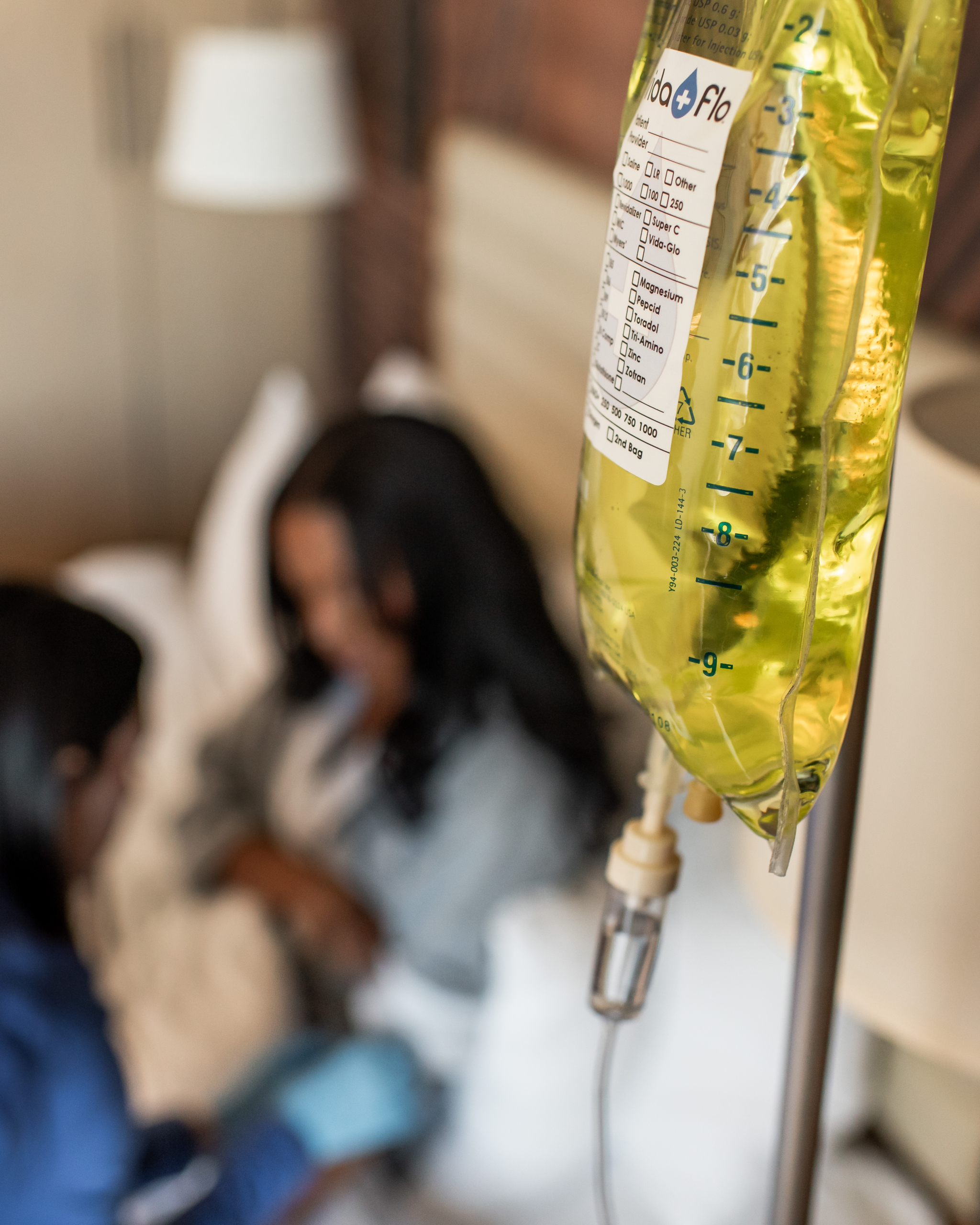 A Vida-Flo client recieving banana bag infusion in Buckhead, GA.