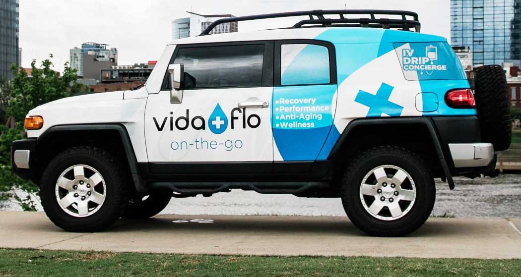A Vida-Flo client looking at Vida-Flo Buckhead's gallery.