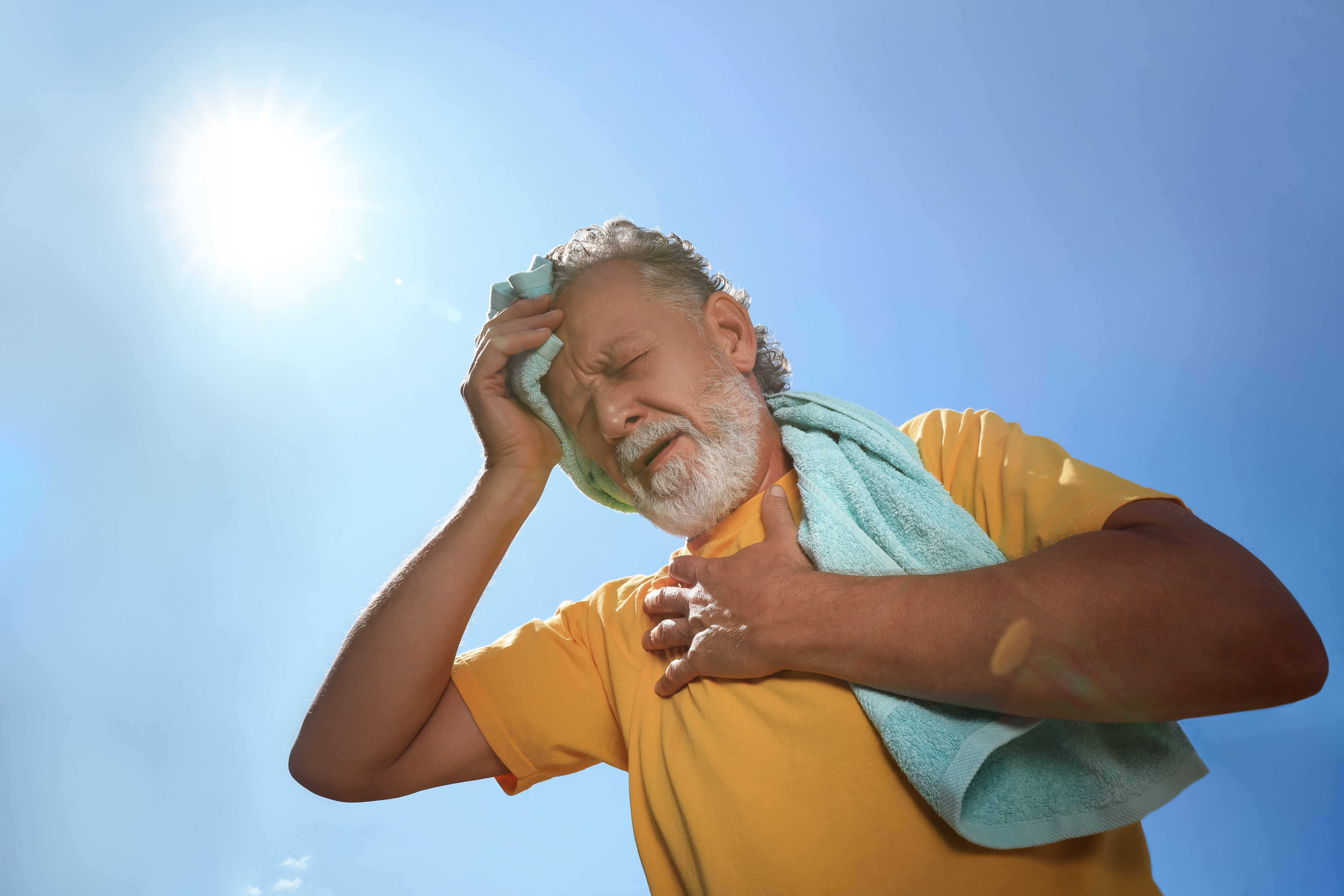 An overheated man in need of relief with iv hydration for heat exhaustion in Buckhead GA from Vida-Flo