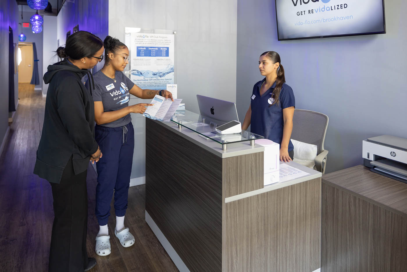 A patient being informed about our infusion therapies in Buckhead, GA.