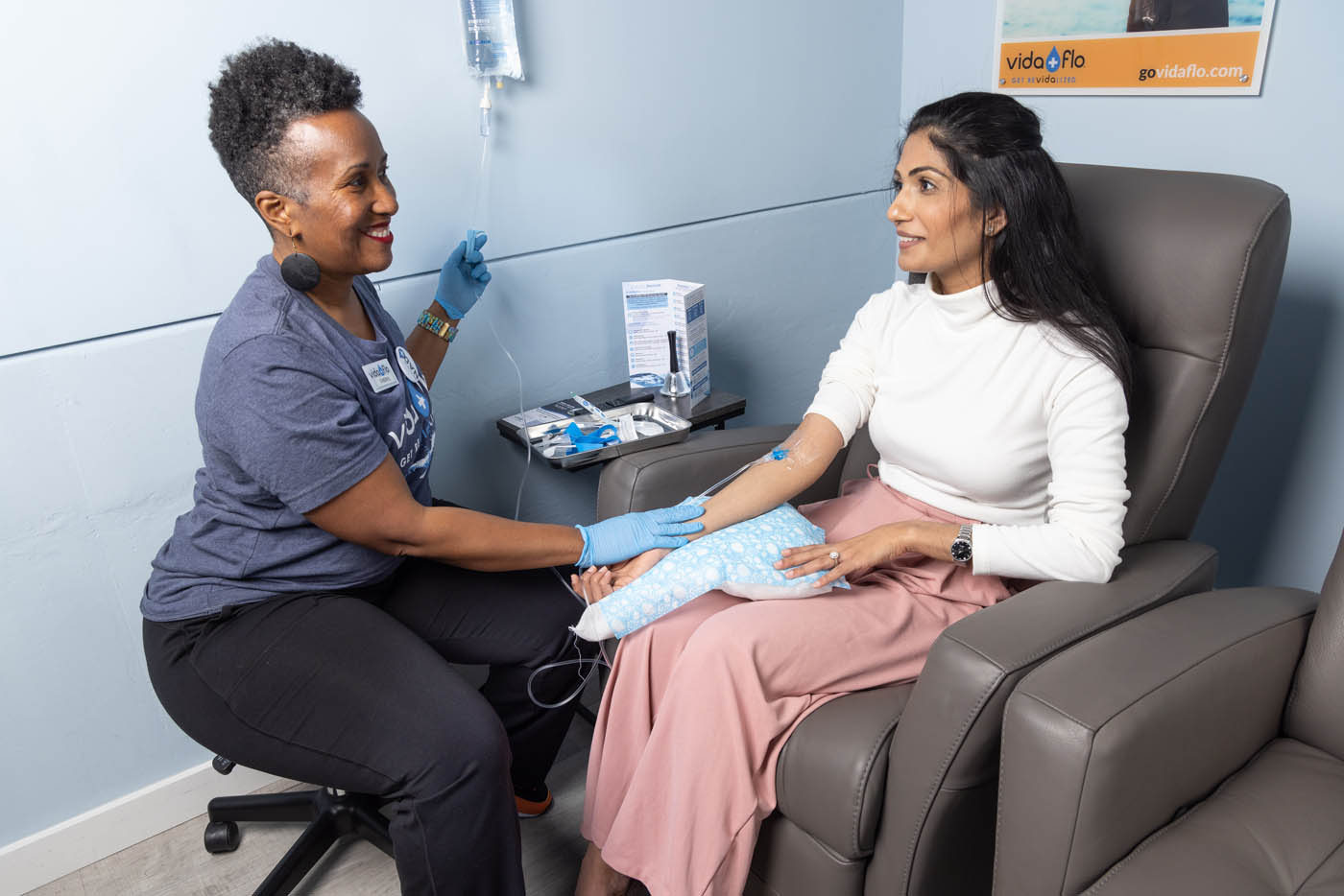 Two women enjoying the benefits of iv drip therapy in Buckhead, GA.